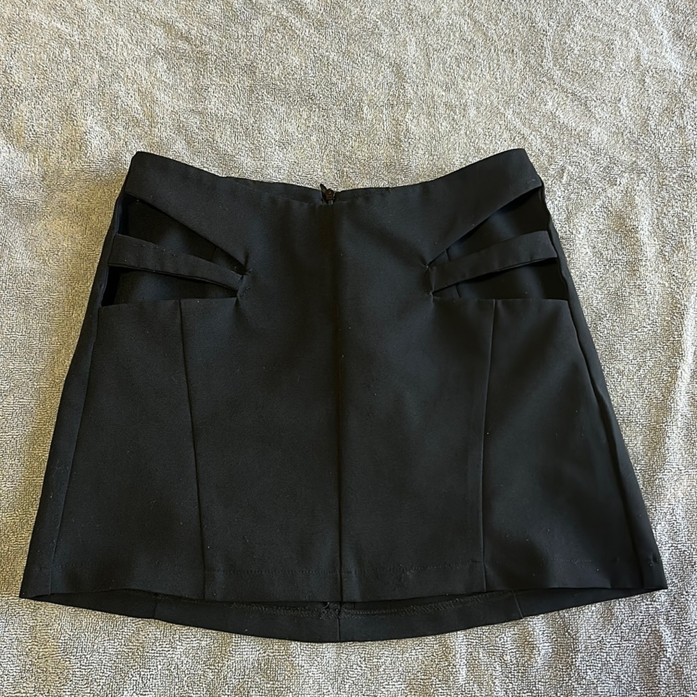 Black mini skirt open from the sides